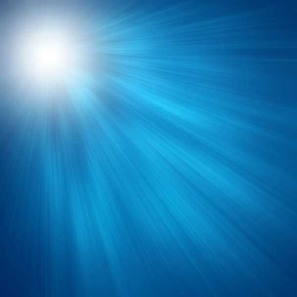 Солнце на голубом небе с бликами от линз
 - Фото, изображение
