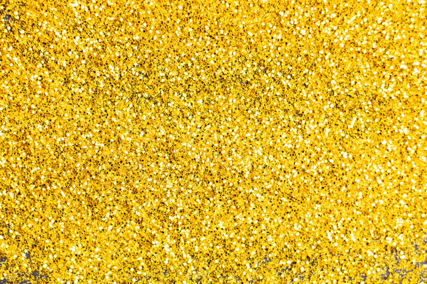 Brillo de oro grunge difuminado fondo abstracto. Luces brillo polvo y textura navideña
 - Foto, imagen