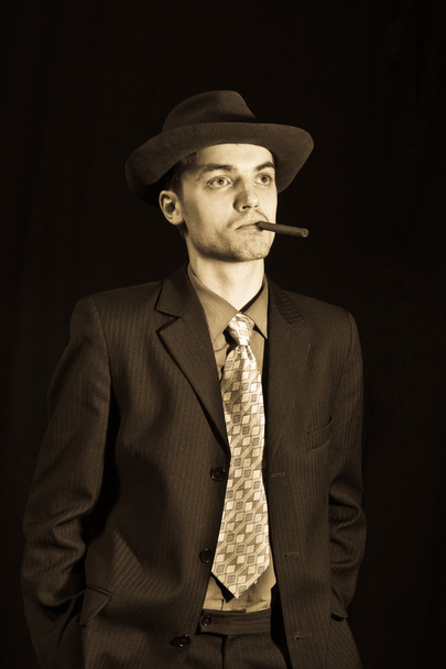 Old style young man with cigar - 写真・画像