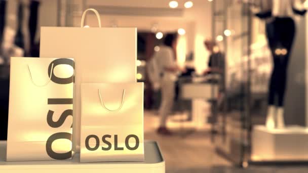İçinde Oslo mesajı olan alışveriş torbaları. Norveç 'te alışveriş kavramsal 3d animasyonla ilgilidir - Video, Çekim