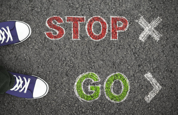 Person choosing between stop or go ahead - Photo, Image