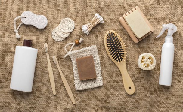Bathroom accessories and essentials on bamboo towel - 写真・画像