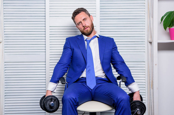 should work for success. challenging himself. businessman hold dumbbell. sport and business. being best. overworker boss. time to relax. Strong powerful business strategy. tired man working hard - Fotografie, Obrázek
