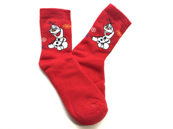 New Year socks isolated on a white background. Red socks for the holiday. Children's socks for the winter. Christmas socks.  - Photo, Image