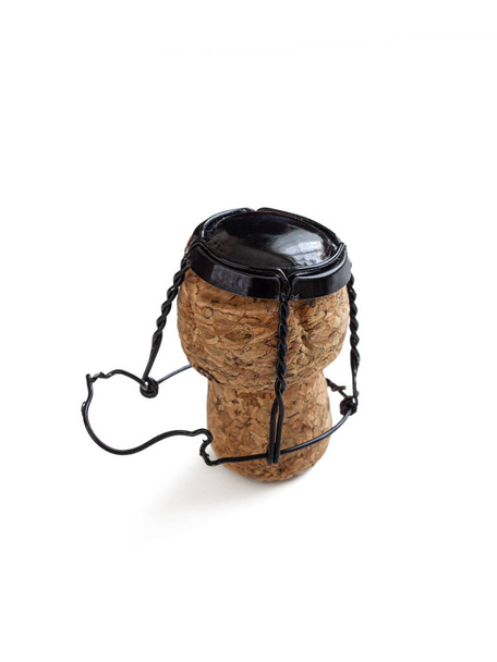 Champagne cork, with a wire muselet and a black metal lid - Photo, Image