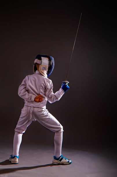 boy engaged in fencing - Foto, afbeelding