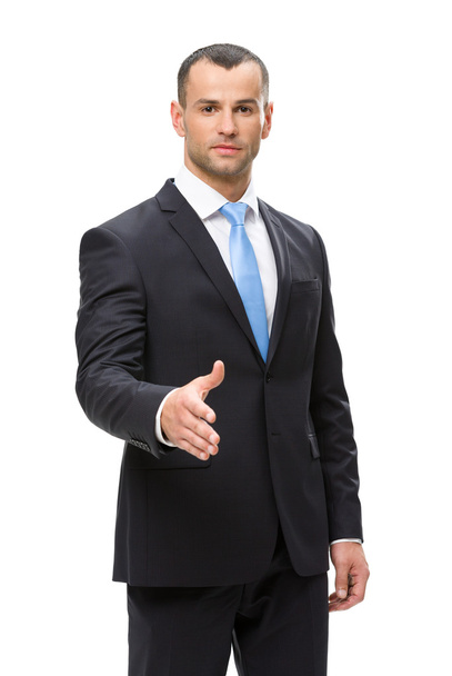 Half-length portrait of business man handshake gesturing - Fotoğraf, Görsel