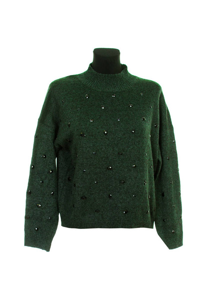 suéter verde de punto decorado con piedras
 - Foto, Imagen
