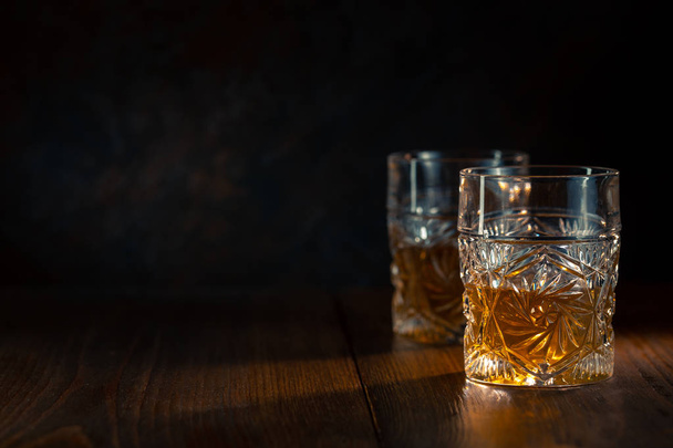Whiskey in glass with ice - Photo, image