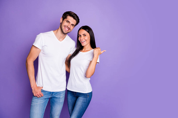 Portrait of his he her she nice attractive lovely cheerful cheery couple hugging girl showing copy space novelty news look isolated on purple violet lilac color pastel background - Φωτογραφία, εικόνα