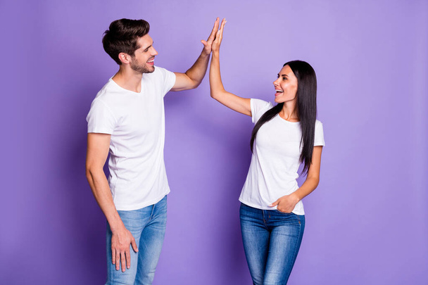 Portrait of his he her she nice attractive lovely cheerful cheery glad couple clapping palms great good team work collaboration agree deal done isolated on purple violet lilac color pastel background - Fotó, kép