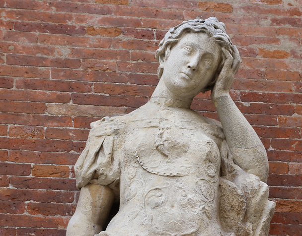 statue with headaches with brick background - Photo, Image