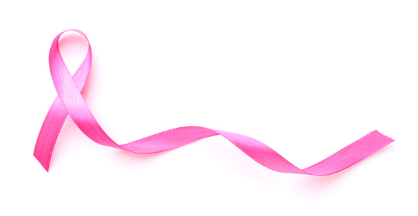 Pink ribbon on white background. Cancer awareness concept - 写真・画像