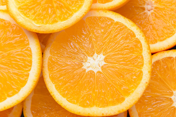 Many fresh orange slices, closeup - Foto, Imagen
