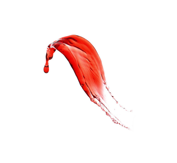 Splashing red wine on white background - Fotó, kép