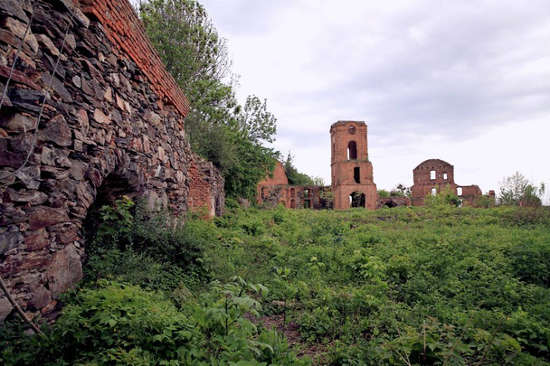 Koretsky castle - the ruined residence of the Korets princes in Korets, Rivne region, Ukraine, small fragments of fortifications of the XV  XVIII centuries have been preserved. The gate tower is depicted on the coat of arms of a modern city. - Photo, Image