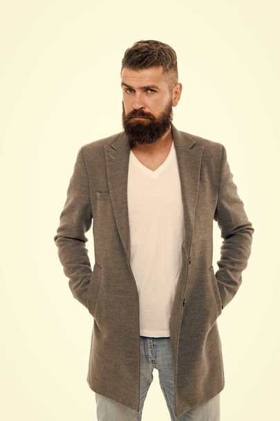 Owner of brutal beard. Caucasian man with brutal appearance. Bearded man with moustache and beard on unshaven face in brutal style. Brutal hipster wearing casual outfit - Photo, image
