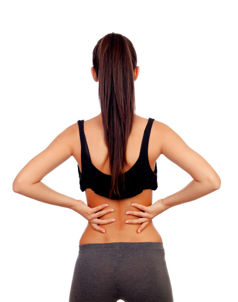 Woman in sport clothes with back pain - Foto, Bild