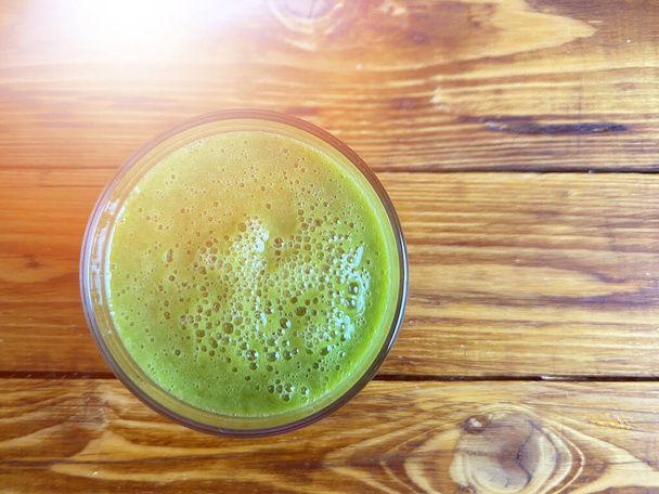 Healthy green smoothie top view - Фото, изображение