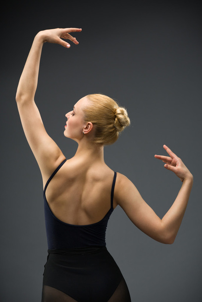 Half-length portrait of dancing female ballet dancer with hands up - Fotoğraf, Görsel
