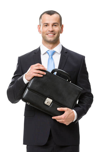 Half-length portrait of business man keeping case - Photo, Image