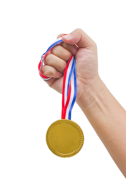 Golden medal in man's hand isolated on white background. - Foto, imagen