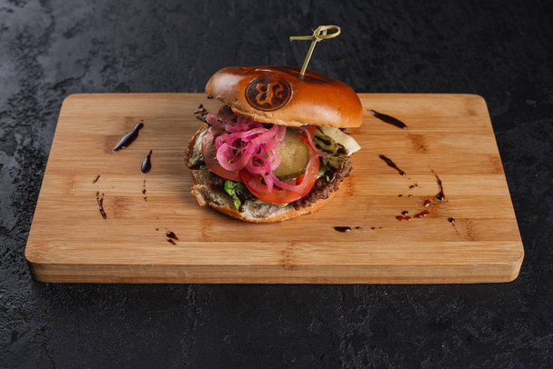 tasty hamburger with tomato and beef  - Φωτογραφία, εικόνα