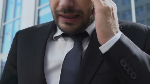 Sick business man taking medicine to relieve headache, stressful life burnout - Video, Çekim