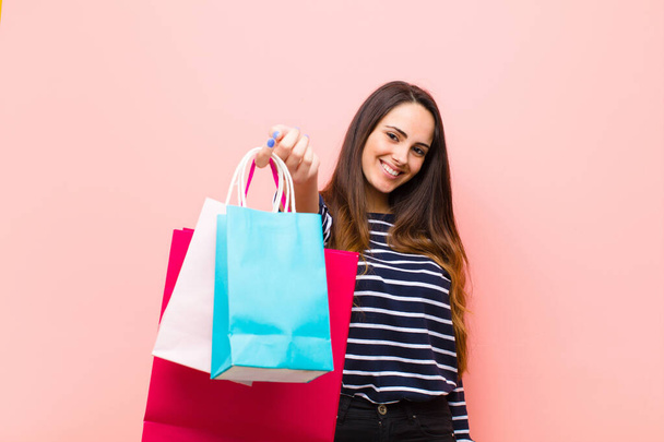 young pretty woman with shopping bags - Фото, зображення