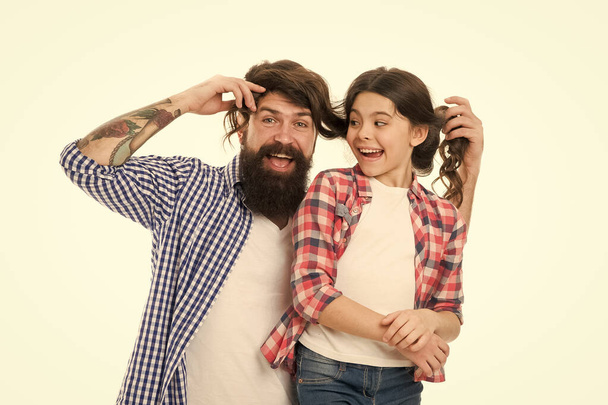 Spending nice time at home. Going crazy together. happy little girl with father. little child love her dad. fathers day. childrens day. family bond. having fun together. father and daughter. haircare - Foto, afbeelding