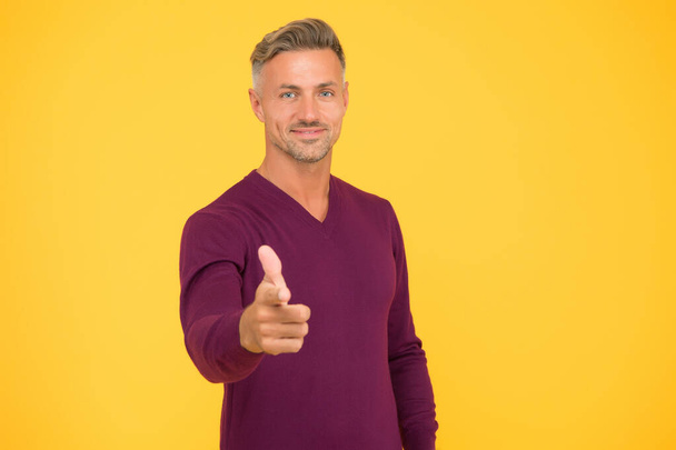 Motivated man. Self confident and motivated. Feeling motivated. You are awesome. Man mature hipster yellow background. Masculinity and brutality. Guy bristle pointing at you. Support and motivation - Foto, imagen