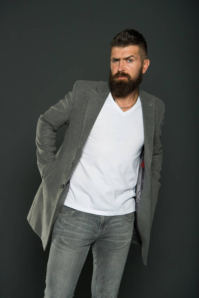 Hipster wearing casual outfit. Clothes shop. Menswear trend. Menswear. Hipster wear comfy outfit. Caucasian man demonstrate fashionable menswear. Bearded man with moustache and beard unshaven face - Photo, image