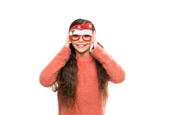 Happy new year. Happy girl wear funny santa hat glasses mask. Little santa happy smiling in holiday mood. Happy holiday greetings. Christmas and new year party - Fotografie, Obrázek