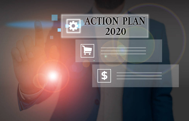 Handschrift tekst schrijven Actieplan 2020. Concept betekent te doen lijst bevat een aantal dingen die volgend jaar moeten worden gedaan. - Foto, afbeelding