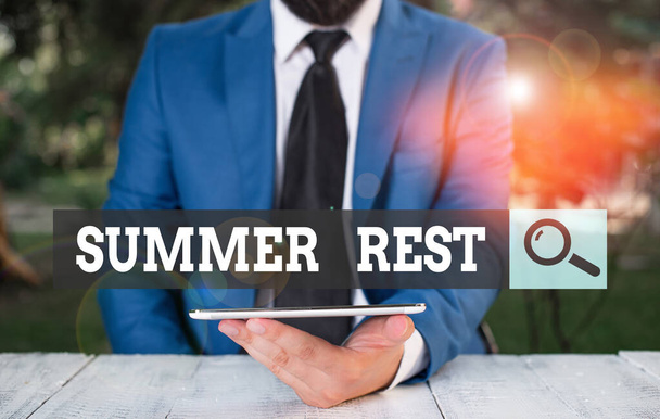 Word writing text Summer Rest. Business concept for taking holiday break or unwind from work or school during summer Businessman with mobile phone in his hand. - Photo, Image