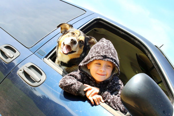 Little Boy and His Dog Hanging Out Minivan Window - Photo, Image
