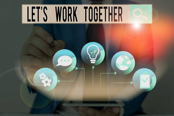 Написание текста Let S Work Together. Бизнес-концепция объединения и объединения сил для достижения общей цели
. - Фото, изображение