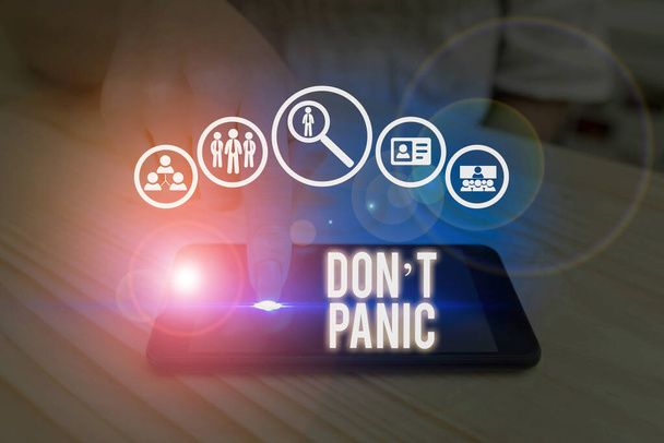 Writing note showing Don T Panic. Business photo showcasing to avoid sudden uncontrollable fear or anxiety Keep calm. - Photo, Image