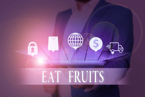 Text sign showing Eat Fruits. Conceptual photo consume any product of plant growth useful to huanalysiss or animals. - Photo, Image