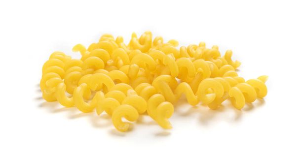 Raw yellow cavatappi pasta isolated on white background - Zdjęcie, obraz