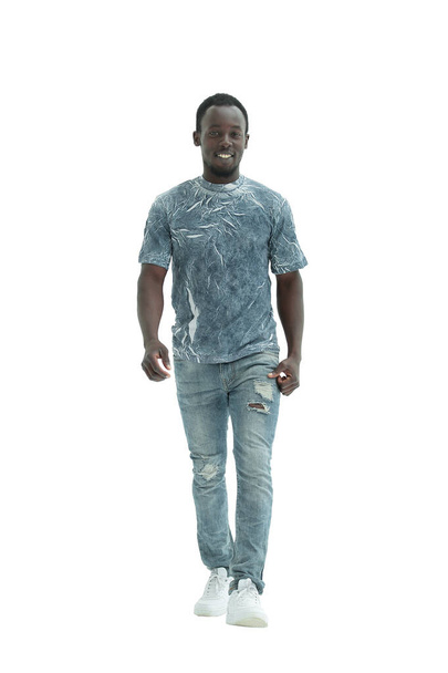 in full growth. smiling guy in stylish jeans. - Valokuva, kuva