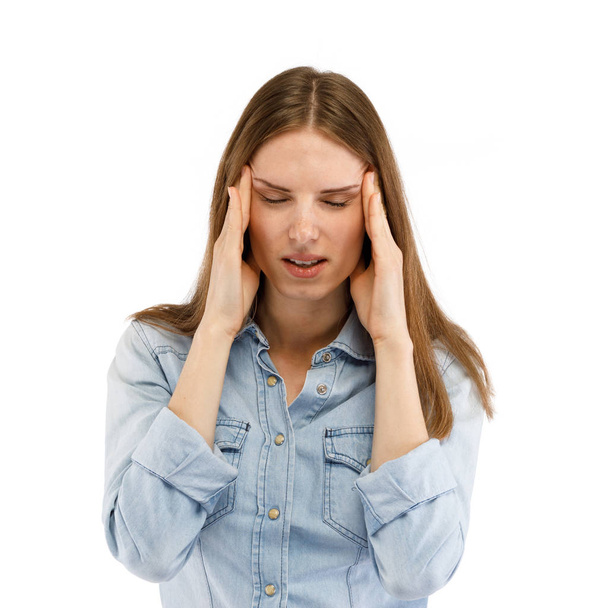 Woman massaging head feeling pain  - Photo, image