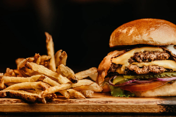 hamburger on a wooden table. - Photo, Image