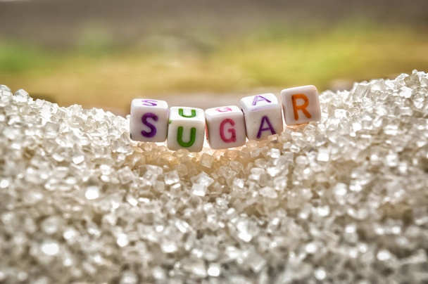 azúcar escribir texto sobre el azúcar montón, escribir sobre el aglomerado de azúcar, s
 - Foto, imagen