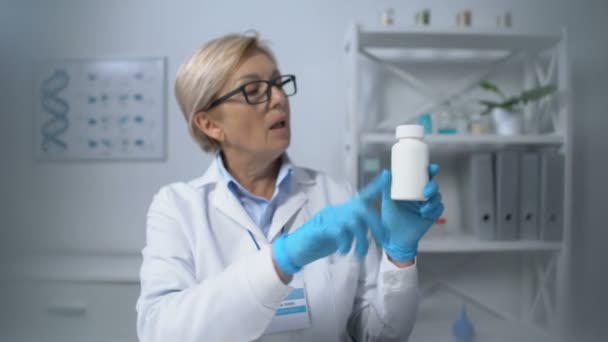 Chief medical officer recommending patient to take vitamins, consultation, pov - Felvétel, videó