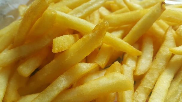 Nahaufnahme von Pommes frites oder gebratenen Scheiben - Foto, Bild