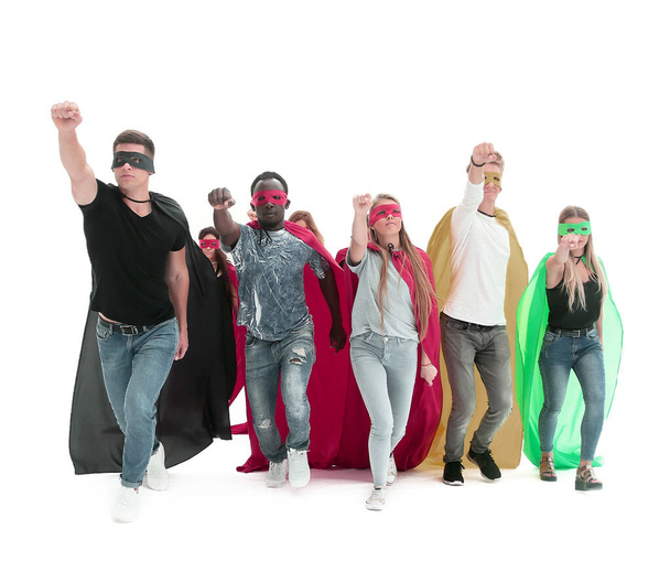 confident team of superheroes walking behind their leader - Фото, изображение