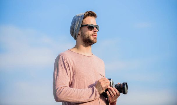 Photographic Story. capture adventure. journalist. sexy man touristic reporter. photographer in glasses. macho man with camera. travel with camera. male fashion style. looking trendy - Φωτογραφία, εικόνα
