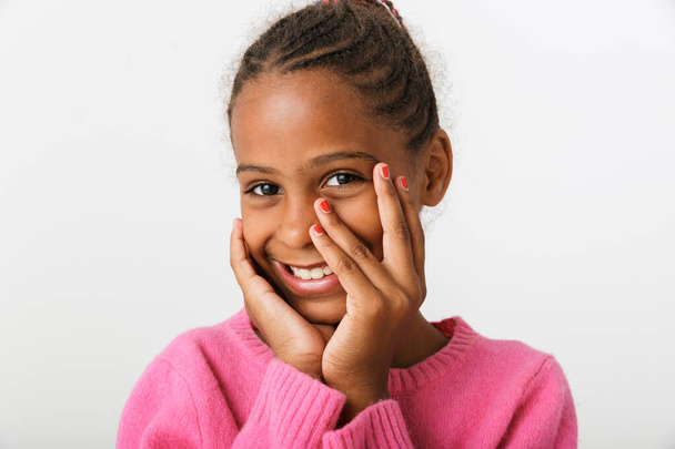 Image closeup of african american girl smiling and looking at camera - Фото, изображение