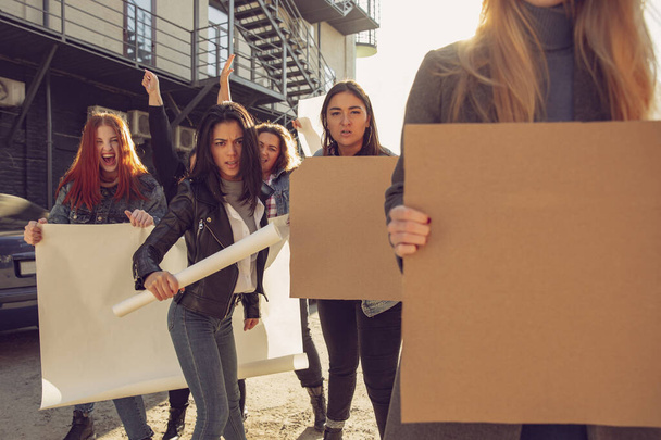 Young people protesting of women rights and equality on the street - Foto, Imagem